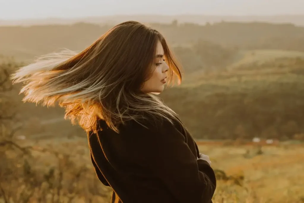 Woman over 45 managing perimenopause hair changes with a gentler routine